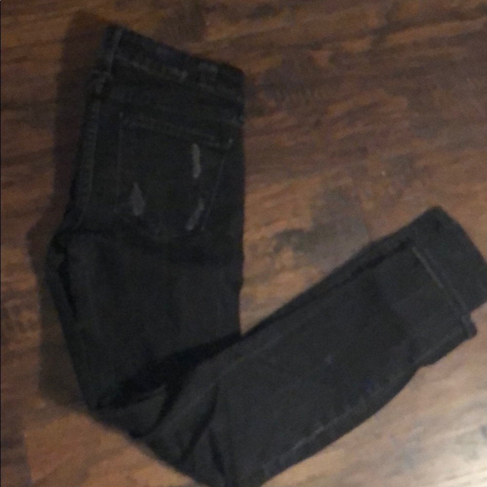Black slightly destructed Vince Camuto jeans
